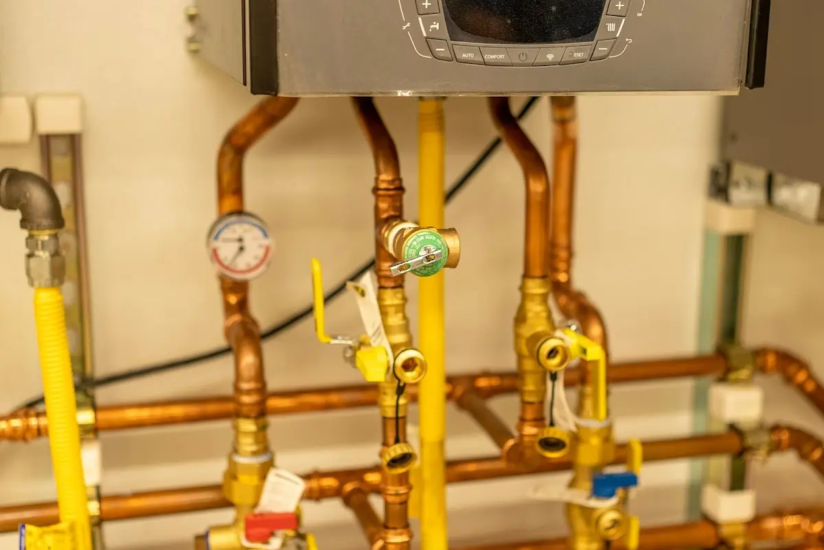 Licensed technician providing Water Heater Installation for a homeowner in New London